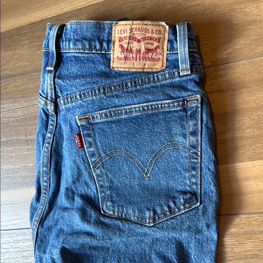 Levi's Blue Ankle Cropped Jeans with Distressed Details